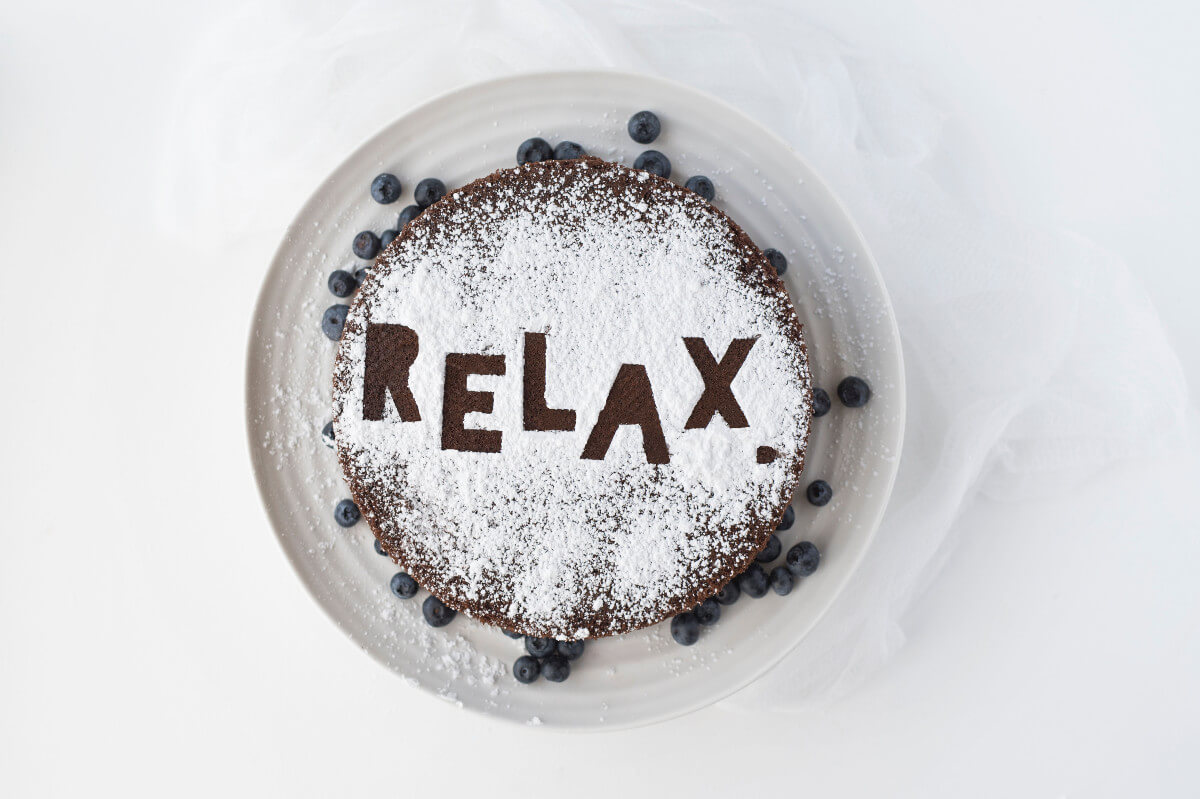 A cake with "Relax" written on it